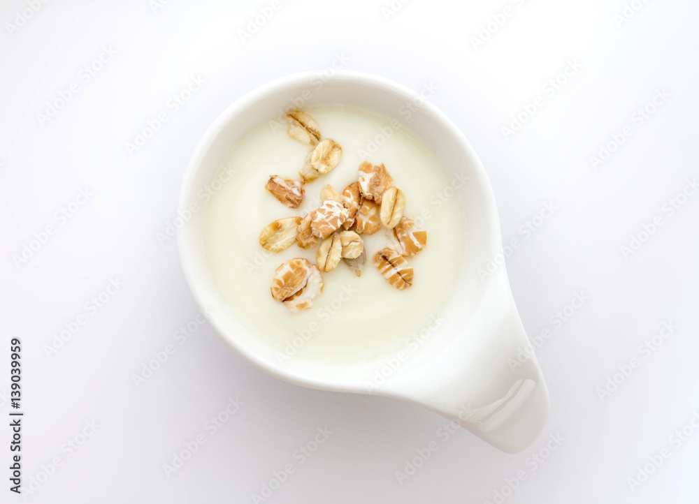 Close up natural creamy white yogurt in cup