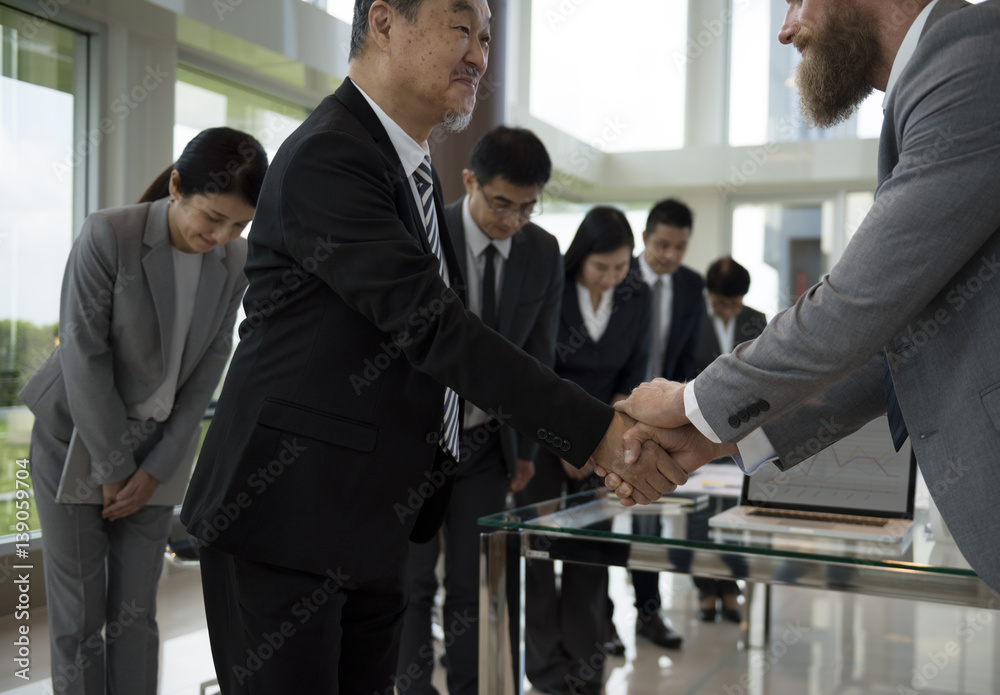 Business Partners Introductionary Handshake Bow