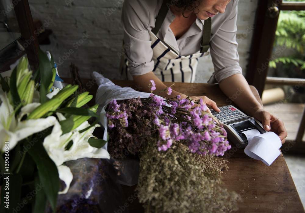 Business of flower shop with woman owner