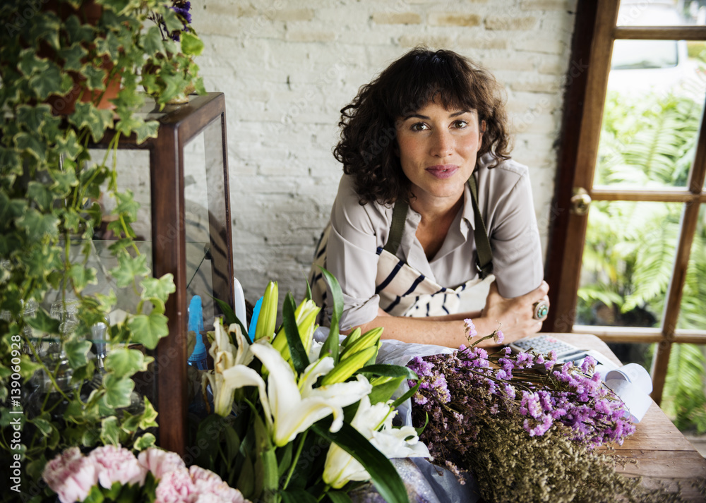 Business of flower shop with woman owner