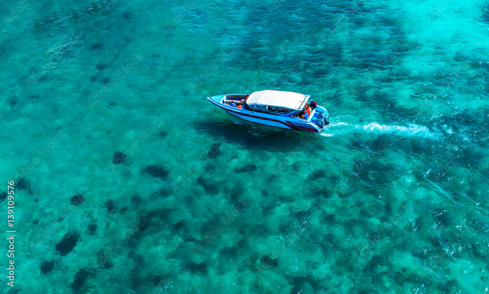 Speed boat in the sea.Aerial view. Top view.amazing nature background.The color of the water and bea