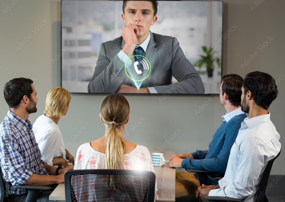 Businessman having a video call with colleagues 