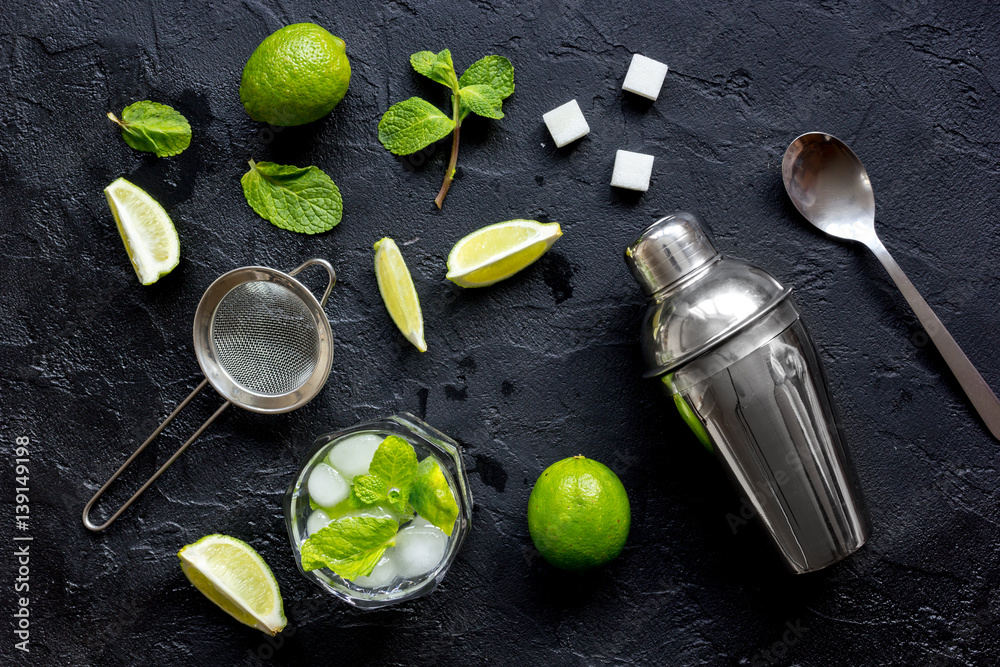 making mojito on dark background top view