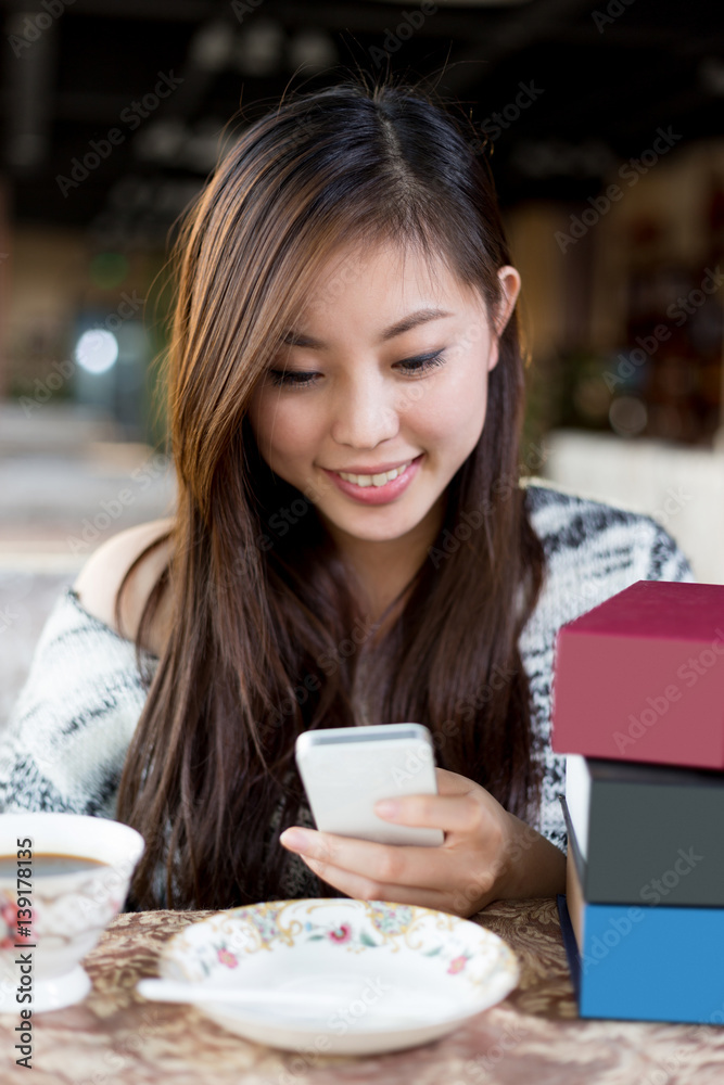 young pretty woman sits in cafe