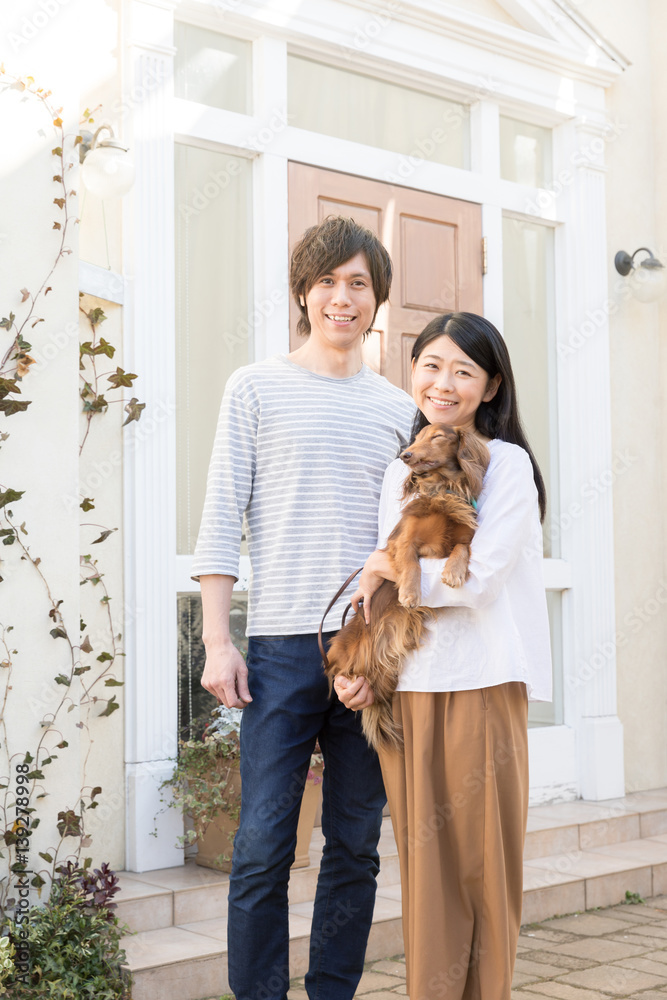 portrait of young asian couple with dog