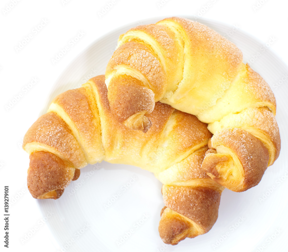 Close - up Delicious and crispy croissant on white background