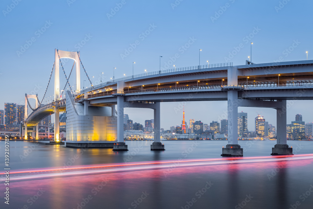 Tokyo Rainbow bridge and Tokyo Tower at twilight