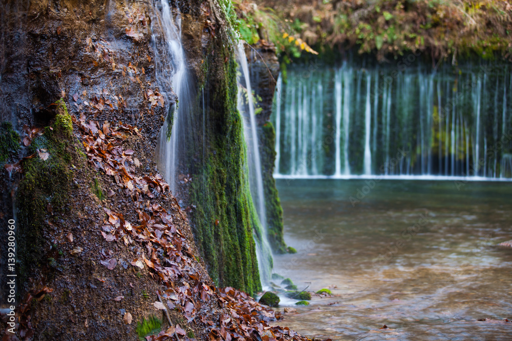 Shiraito Waterfall in autumn season ,  is located in the forests north of downtown Karuizawa , Japan