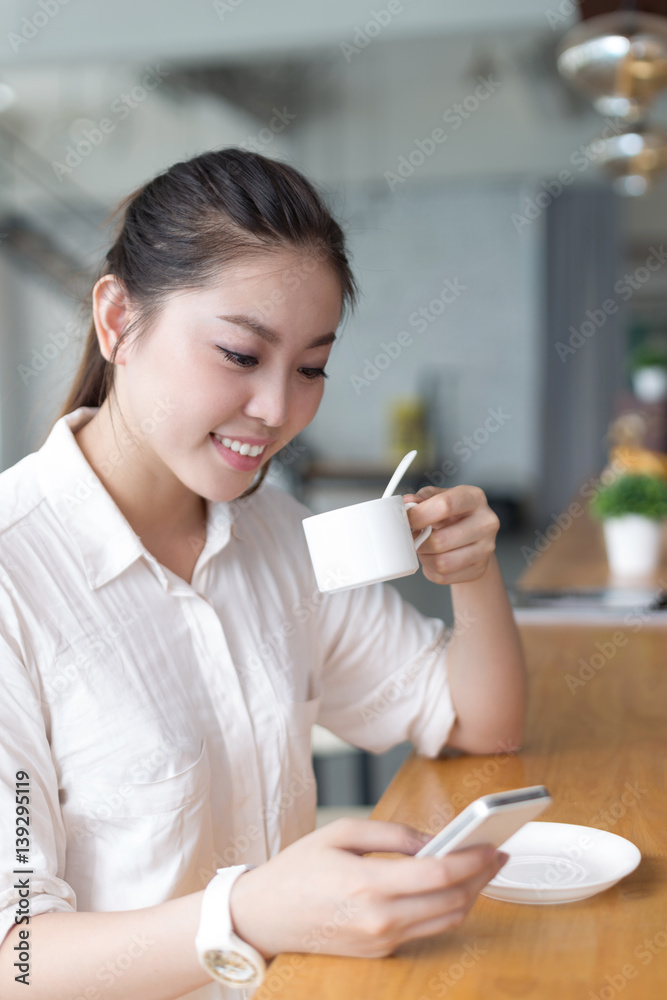 young pretty woman relaxes in office