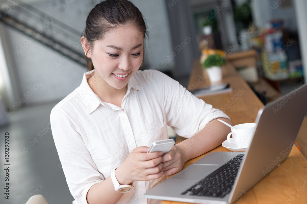 young pretty woman relaxes in office