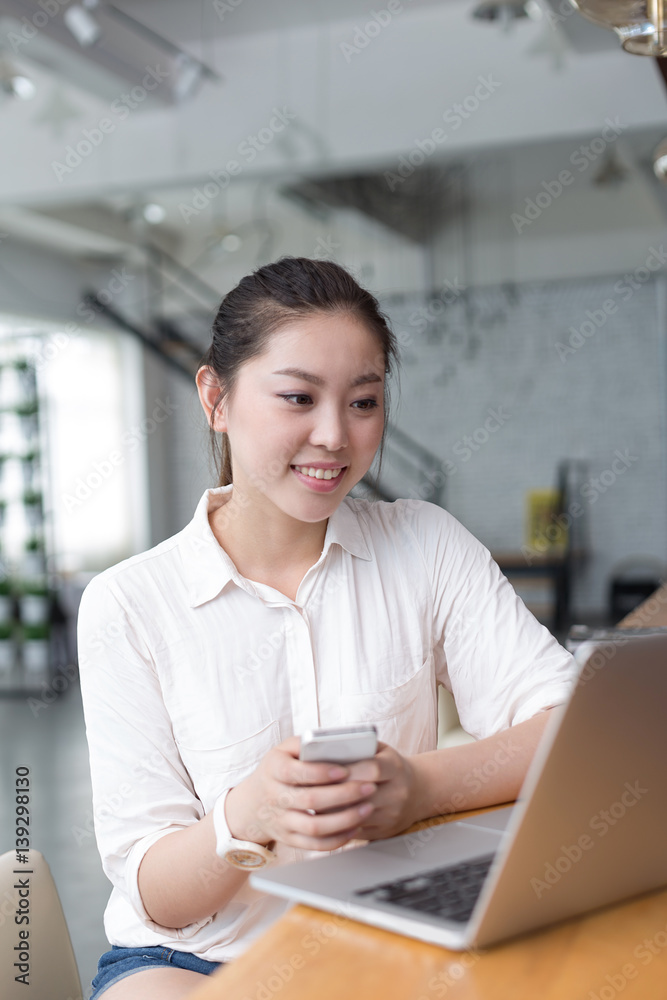 young pretty woman relaxes in office