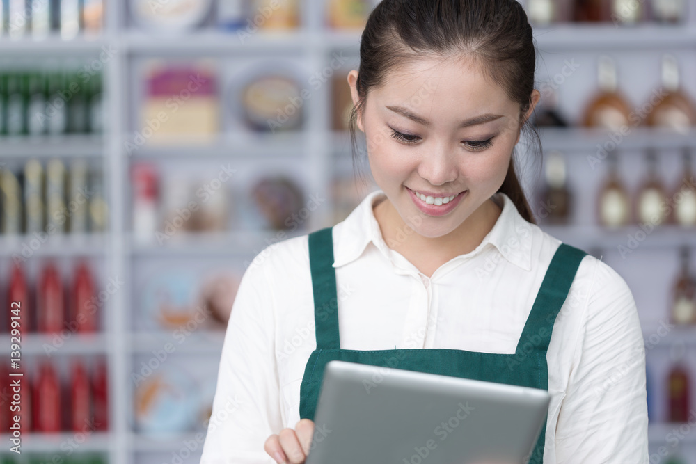 young pretty woman works in retail