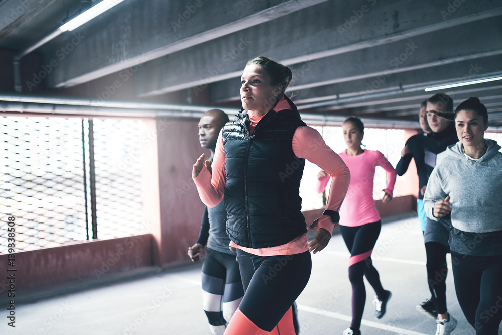 Team of athletes running.