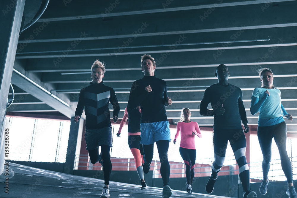 Young sportsmen and women running