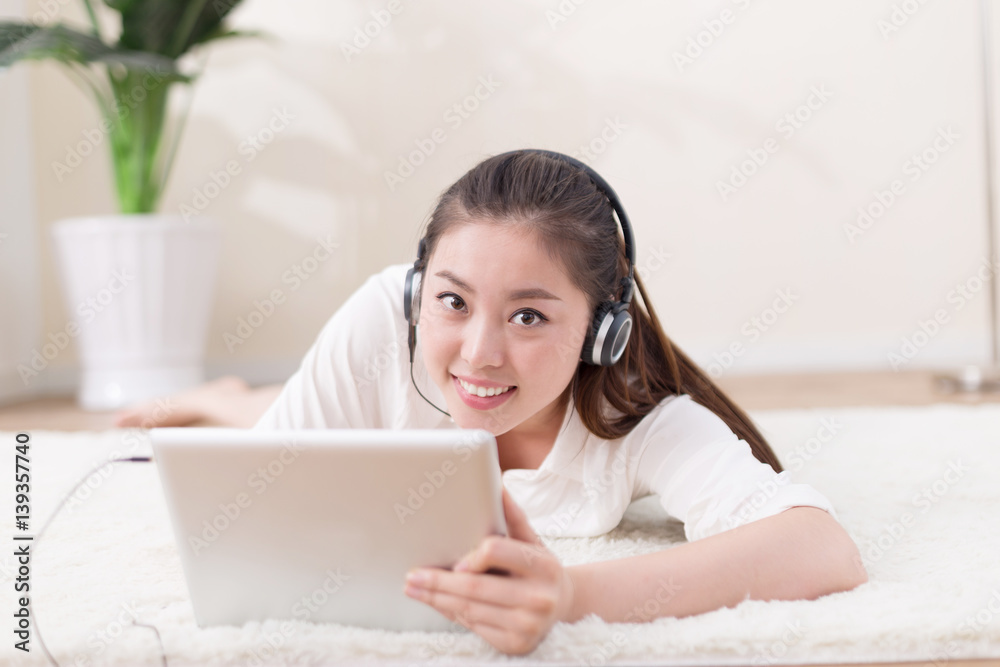 young pretty woman relaxes on blanket