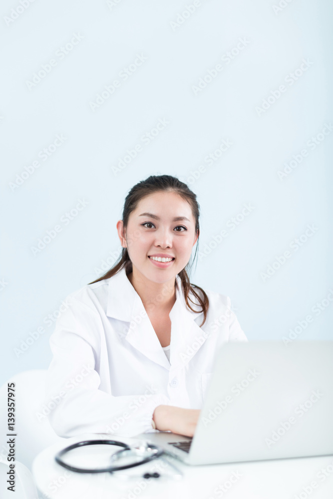 young pretty woman doctor in clinic