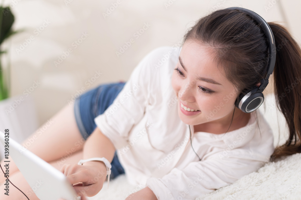 young pretty woman relaxes on blanket