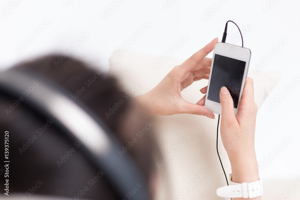 young pretty woman relaxes with mobile phone