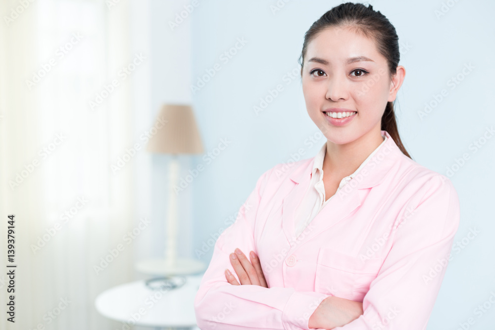 young pretty chinese woman nurse in hospital