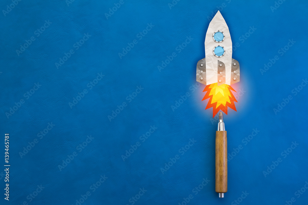 wooden pencil with paper rocket creativity ideas concept with free copyspace