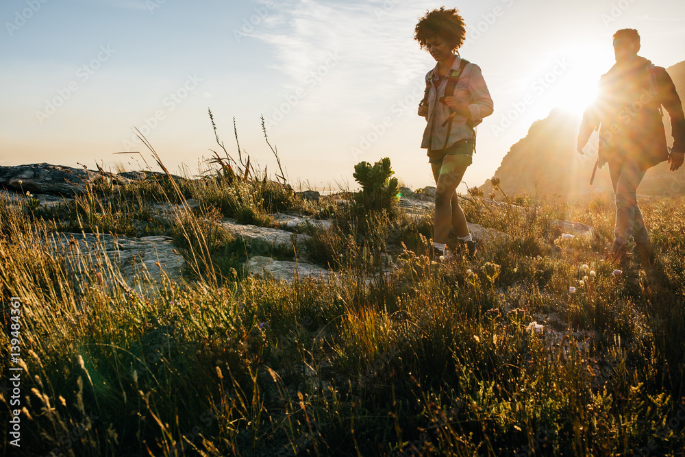 Young people hiking on a summer day