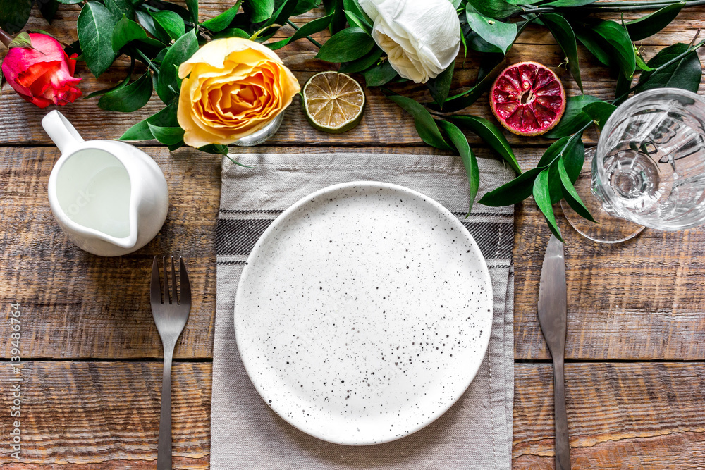 ceramic tableware top view on wooden background mock up