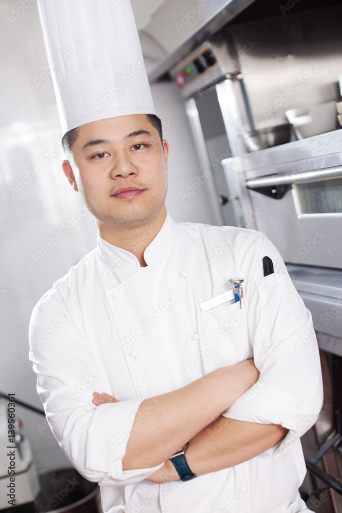 young man chelf in modern kitchen