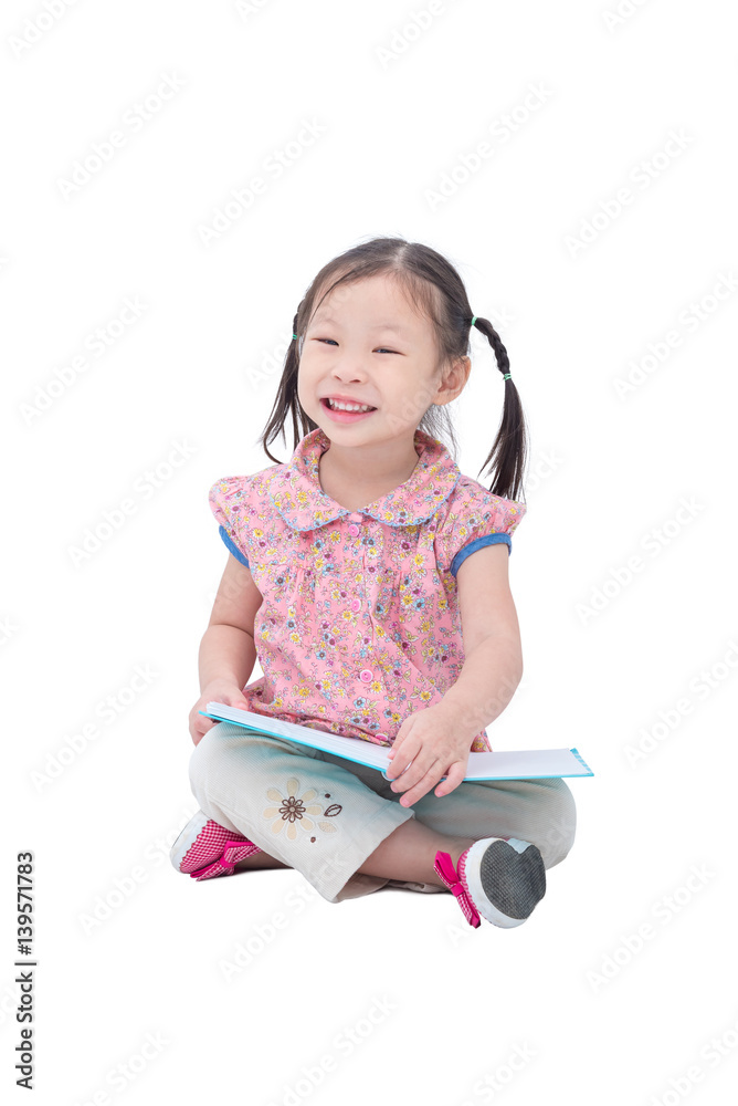 Little asian girl reading book over white