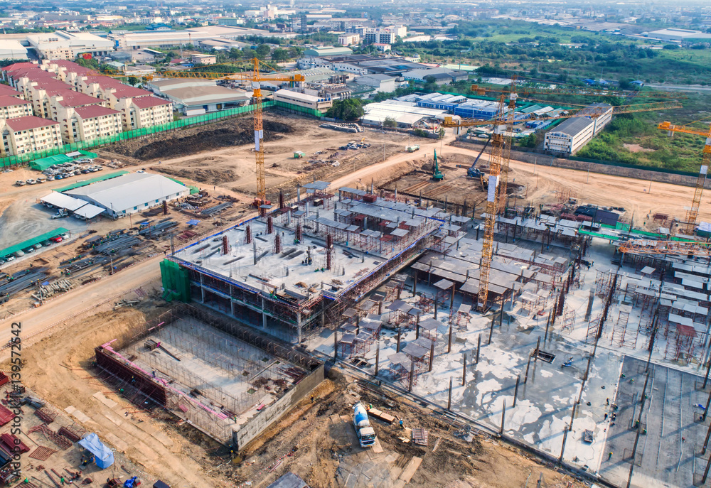 Construction site with cranes. Construction workers are building.Aerial view.Top view.