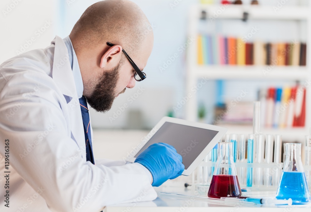 Man researcher carrying out scientific research.