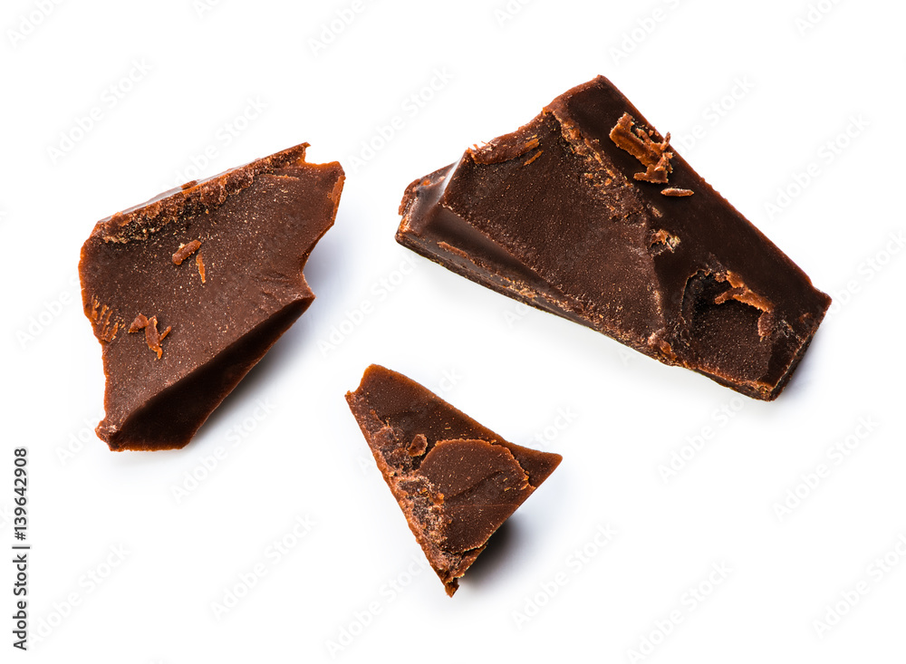 Chocolate pieces isolated on white background with clipping path. Top view.