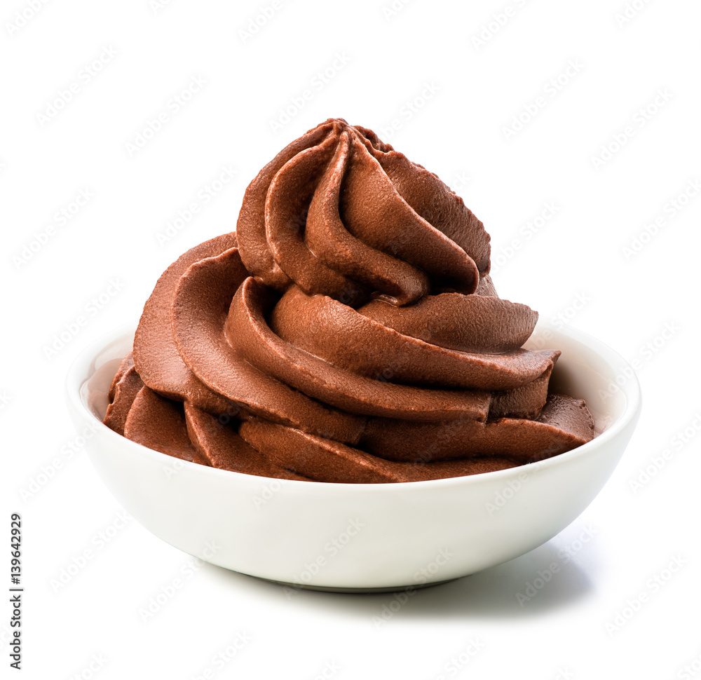 Bowl of chocolate whipped cream isolated on white background with clipping path. Macro.