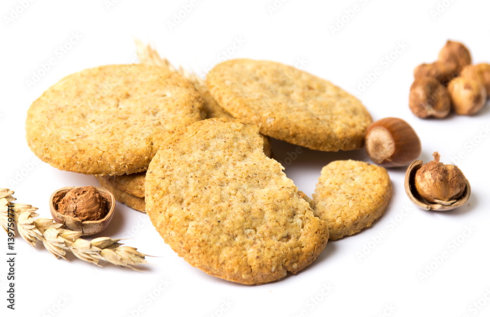 Integral cookies with hazelnuts and linseed on white