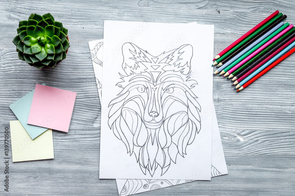 coloring picture for adults on wooden background top view