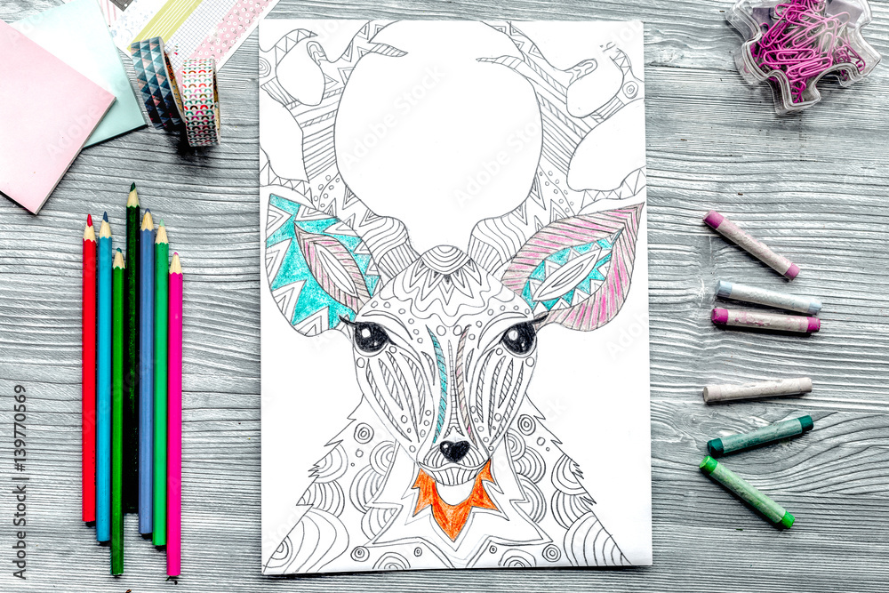 coloring picture for adults on wooden background top view