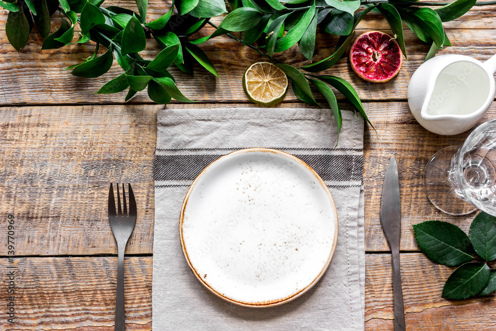 ceramic tableware top view on wooden background mock up