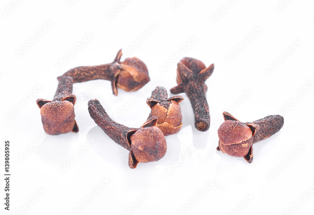 dry cloves on white background