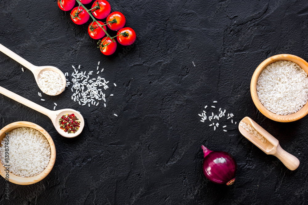 ingredients for paella on dark background top view