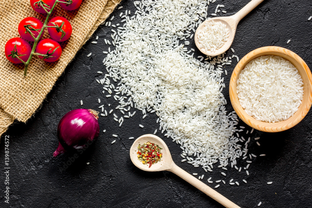 ingredients for paella on dark background top view