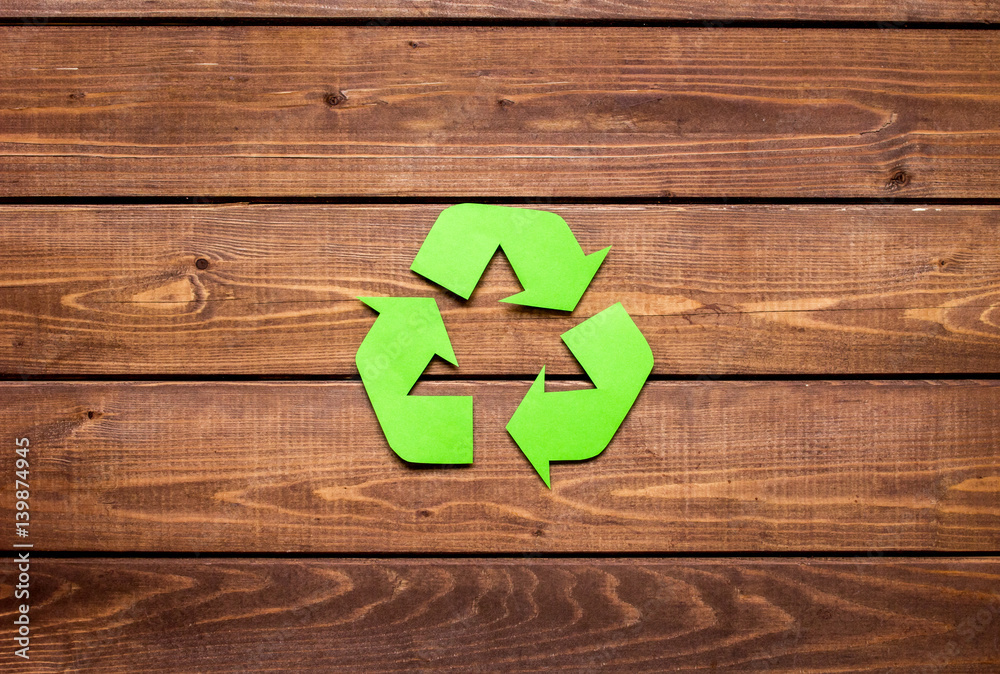 recycling symbol in eco concept on rustic background top view mock-up