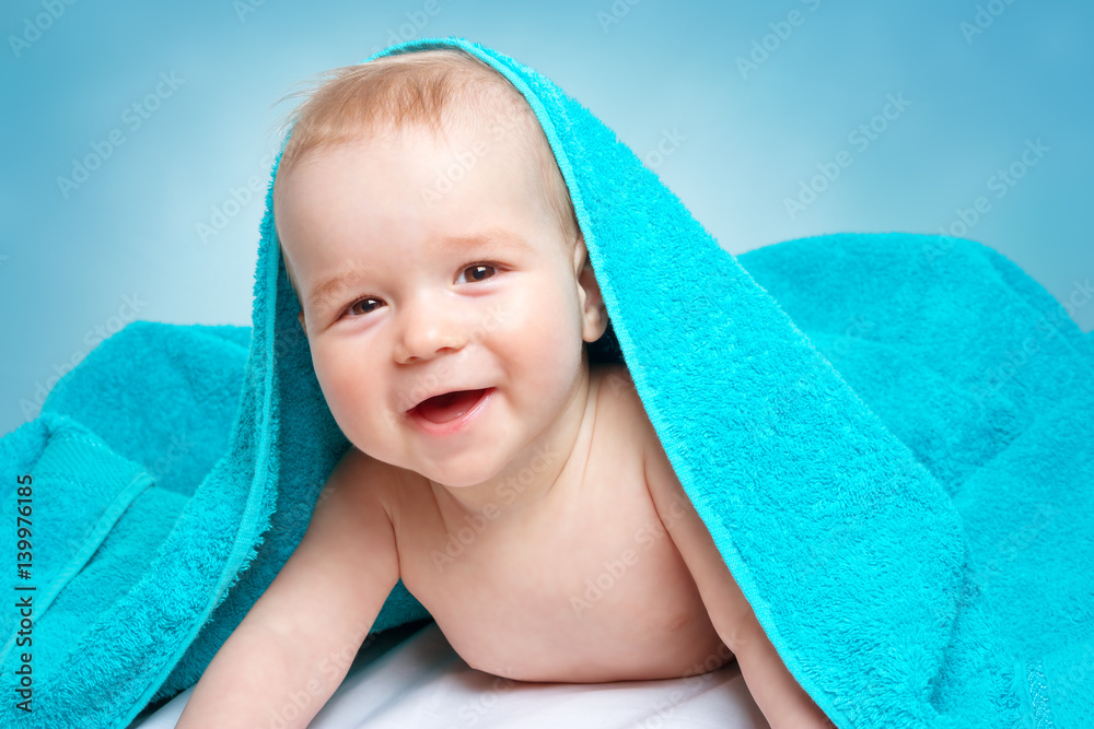 Cute baby in a towel