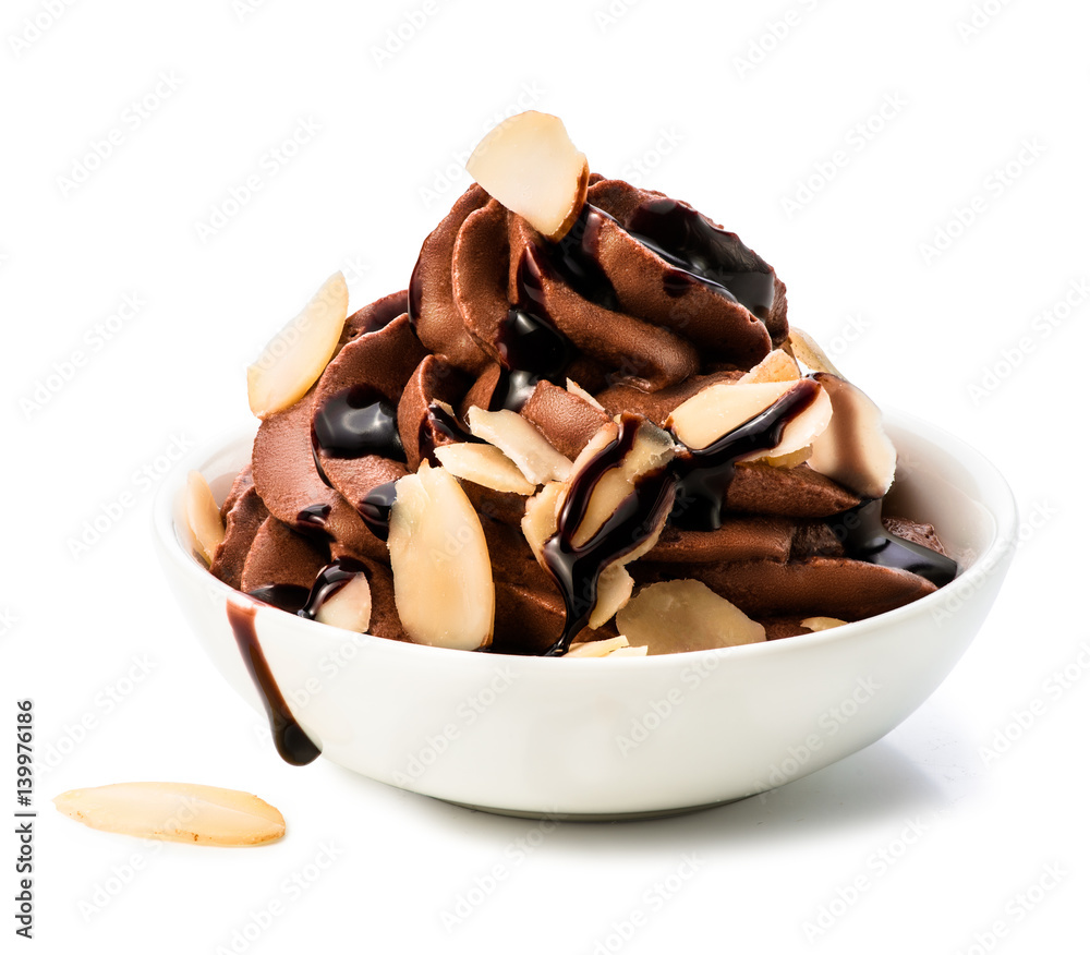 Bowl of chocolate whipped cream with slices of almond isolated on white background by clipping path.