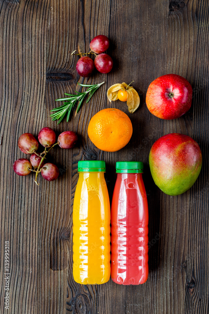 summer fresh drink in plastic bottle on wooden background top view mock-up