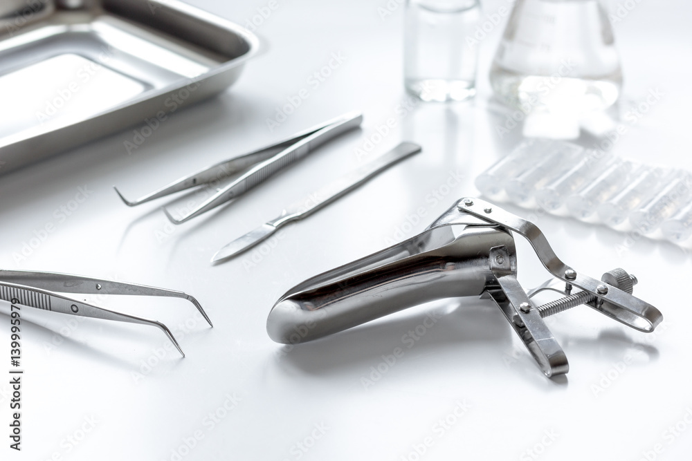 instruments of gynecologist on white background