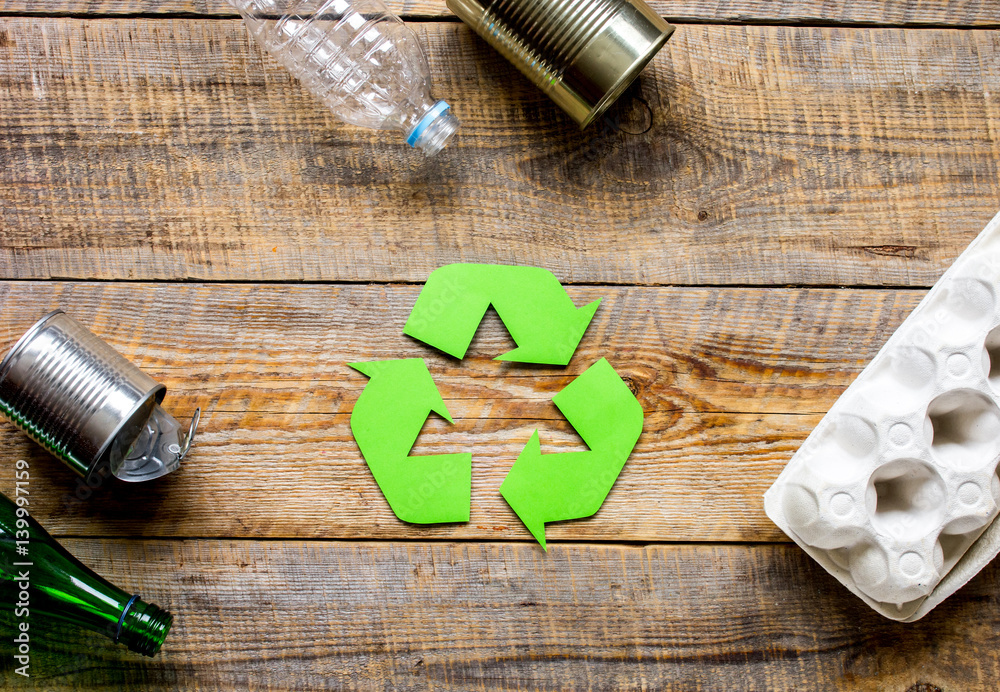 environment concept with recycling symbol on rustic background top view mockup