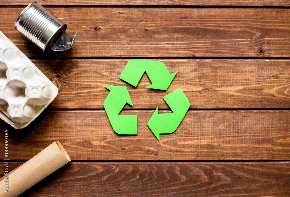 Eco concept with recycling symbol on table background top view mock-up