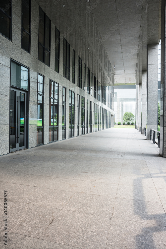 empty footpath and modern building in modern city