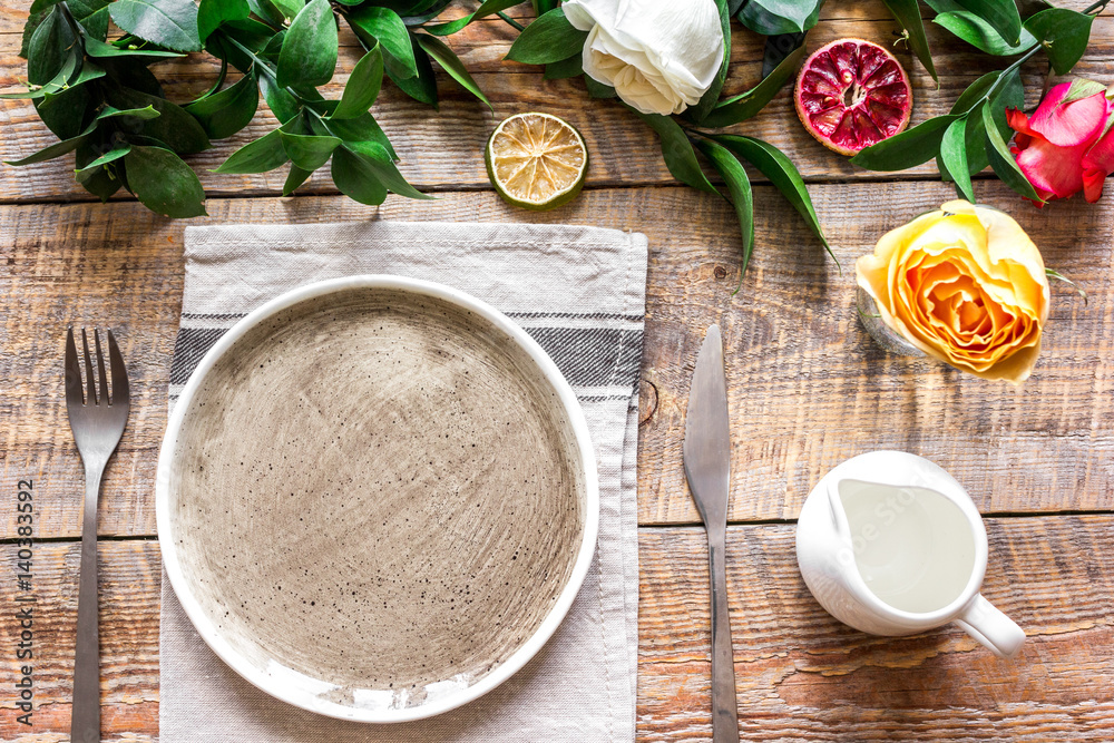 ceramic tableware top view on wooden background mock up