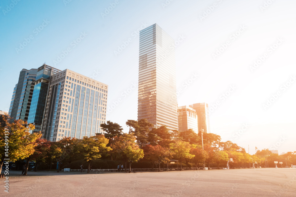 empty basketball court near modern buildings