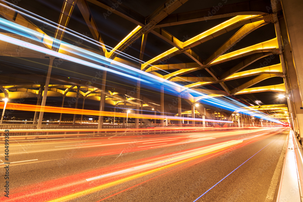 busy traffic on bridge at night